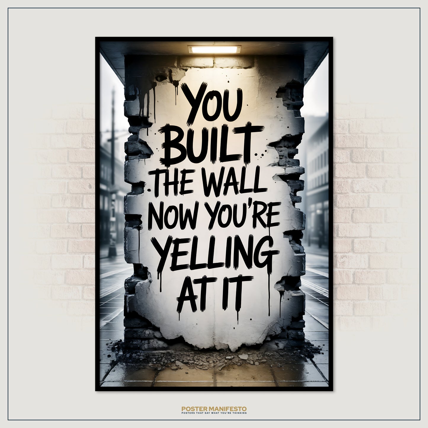 Poster with text 'You built the wall, now you're yelling at it' on a wall with a broken section.
