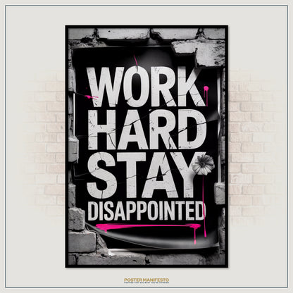 Motivational poster with 'Work Hard Stay Disappointed' text on a brick wall background