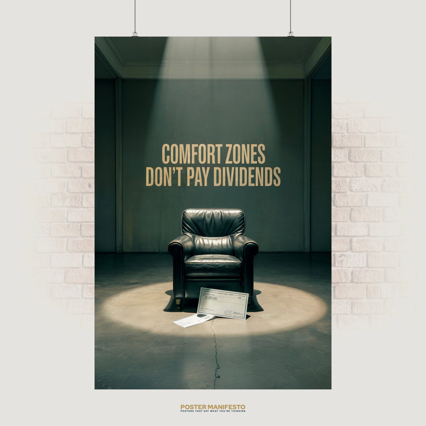 Motivational wall art with phrase “Comfort Zones Don’t Pay Dividends” above a leather chair spotlighted with million-dollar checks on the floor.