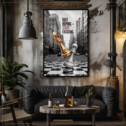 Living room with a framed poster of chess pieces on a checkered background, a black sofa, and a small table with bottles and glasses.
