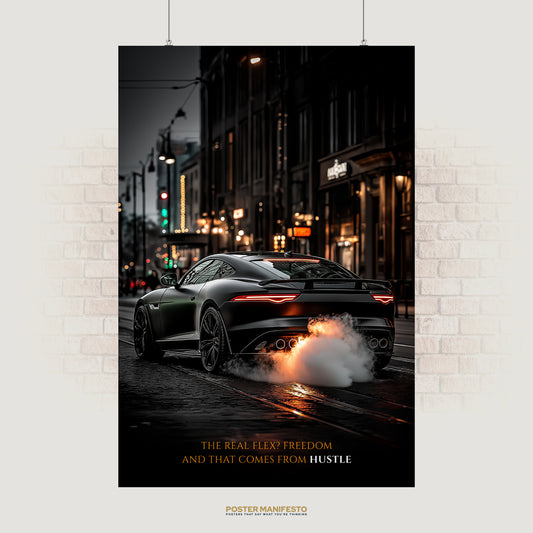 Motivational wall art featuring a black sports car on a city street with exhaust flames and the quote The Real Flex Is Freedom And That Comes From Hustle highlighting ambition.