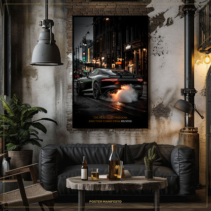Living room with a black leather sofa, wooden coffee table, and a framed poster of a car on the wall.