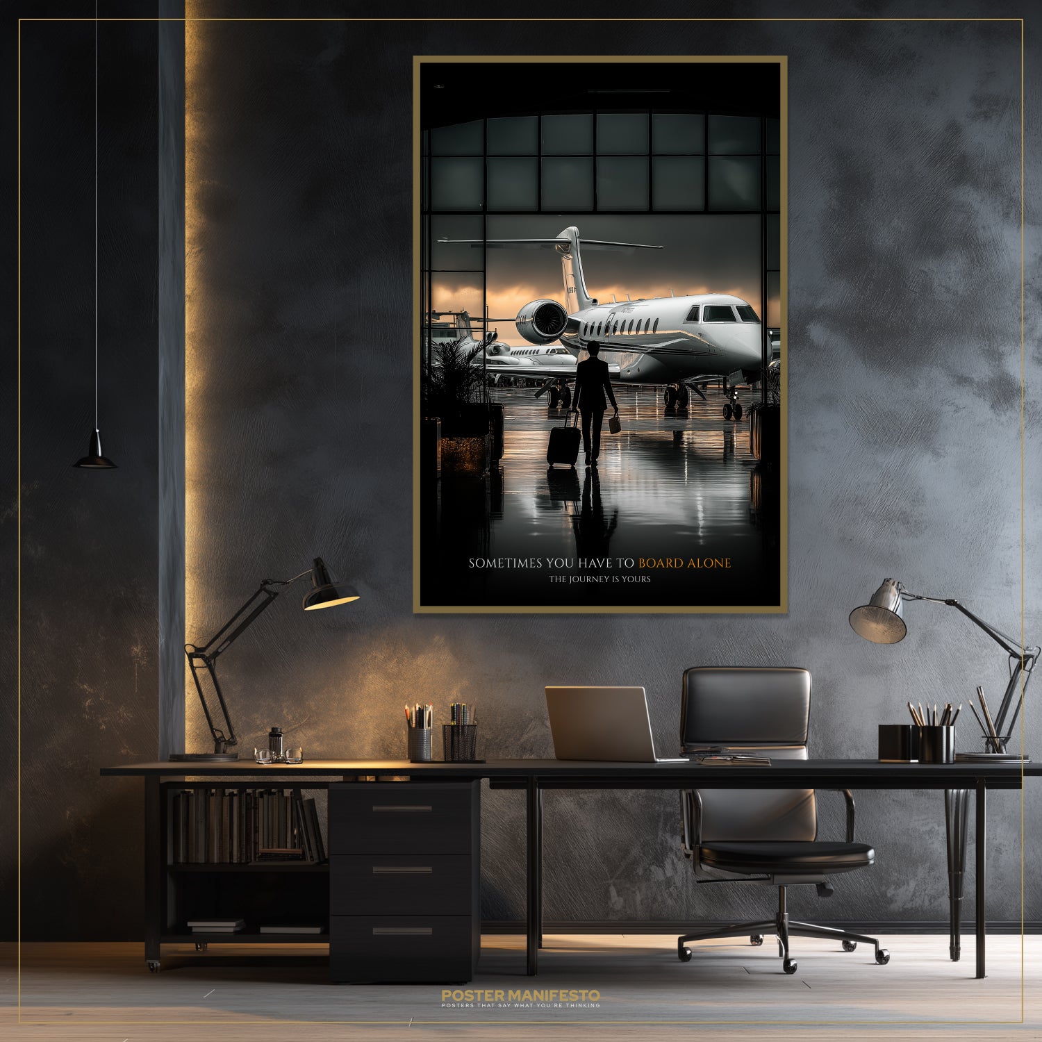 Modern office setup with a framed poster of an airplane on a wall.