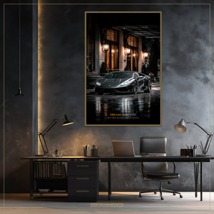 Modern office setup with a framed poster of a sports car on a dark wall.