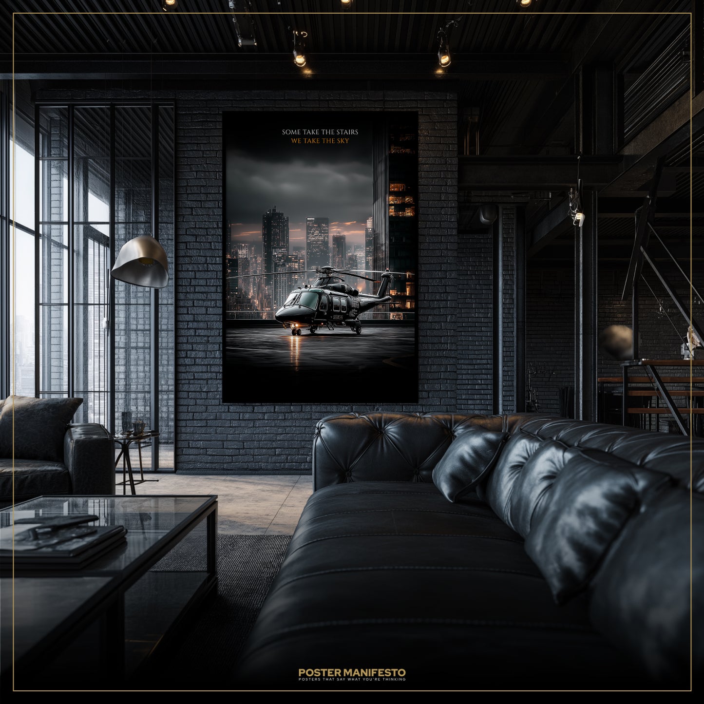 Modern living room with a large black leather sofa and a framed helicopter poster on the wall.