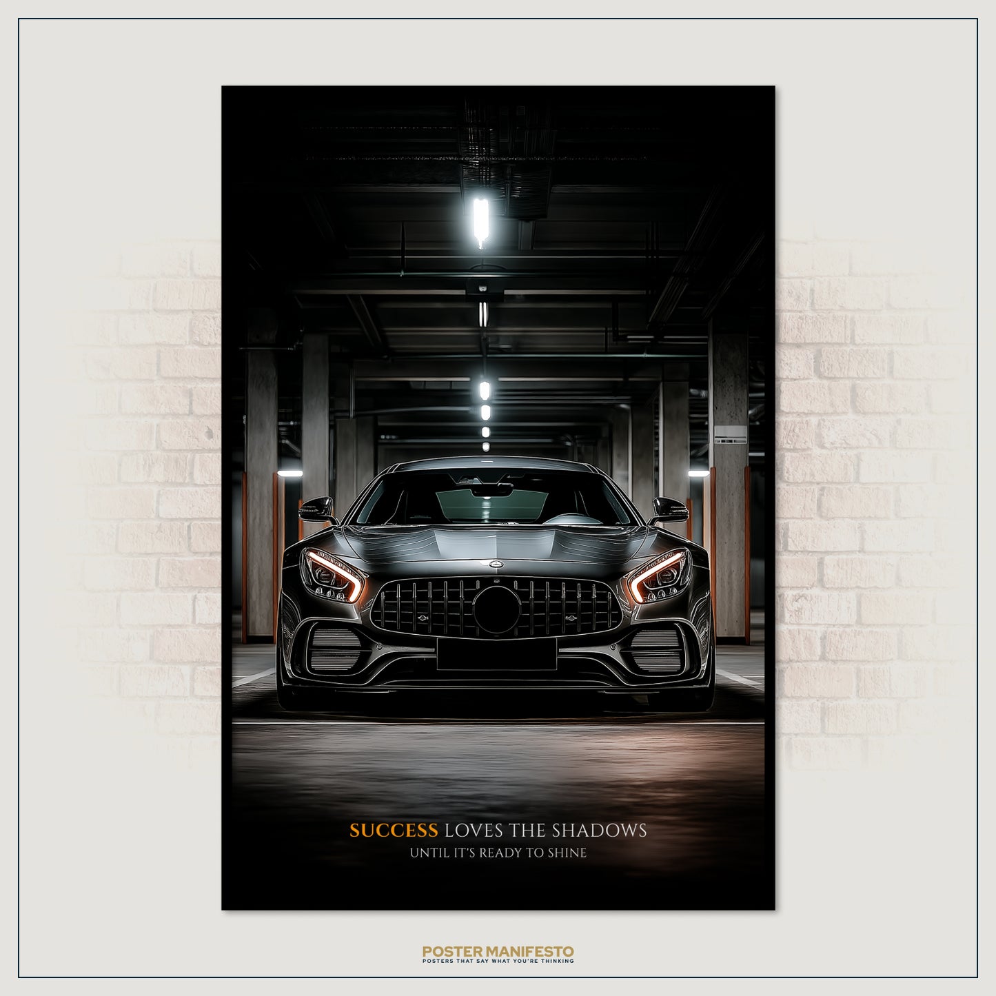 Poster of a black sports car in a garage with motivational quote.