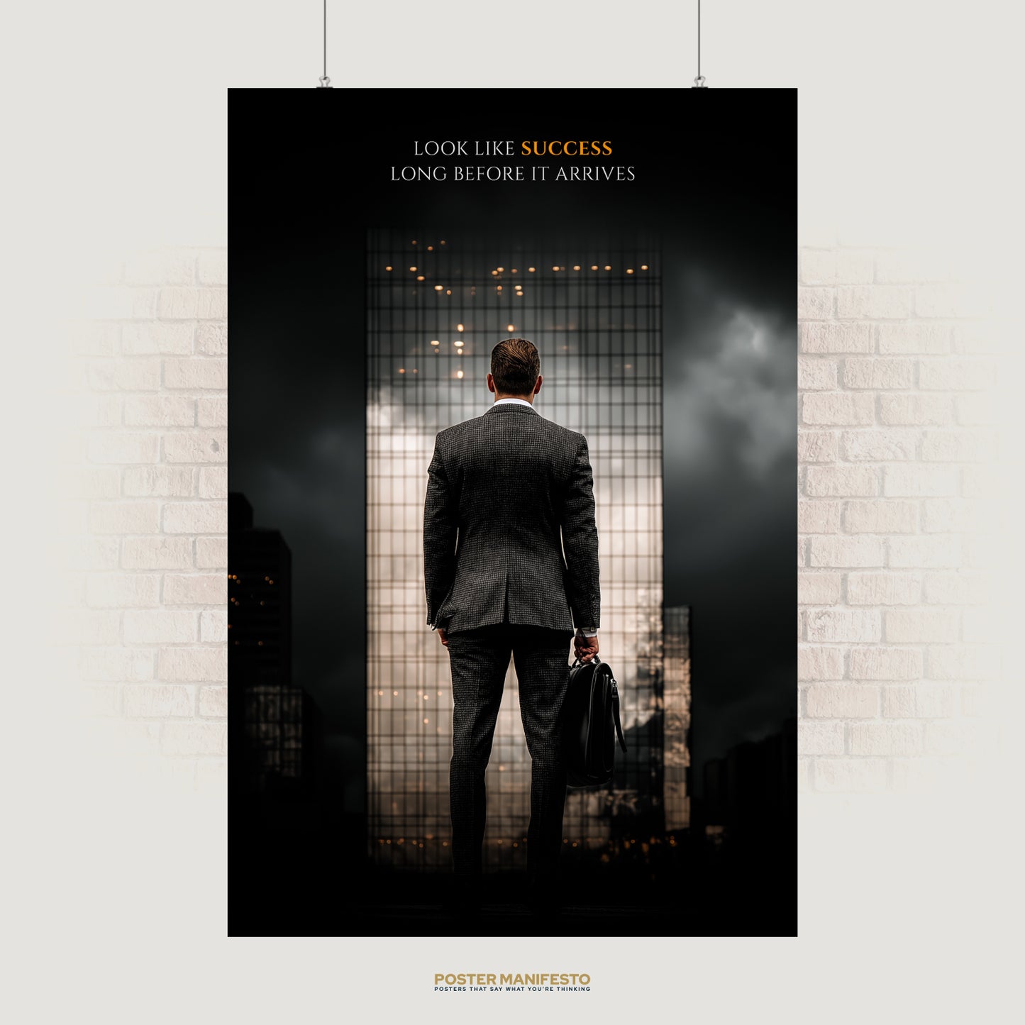 Motivational poster of a businessman in a suit facing a skyscraper, paired with the quote “Look Like Success Long Before It Arrives.”
