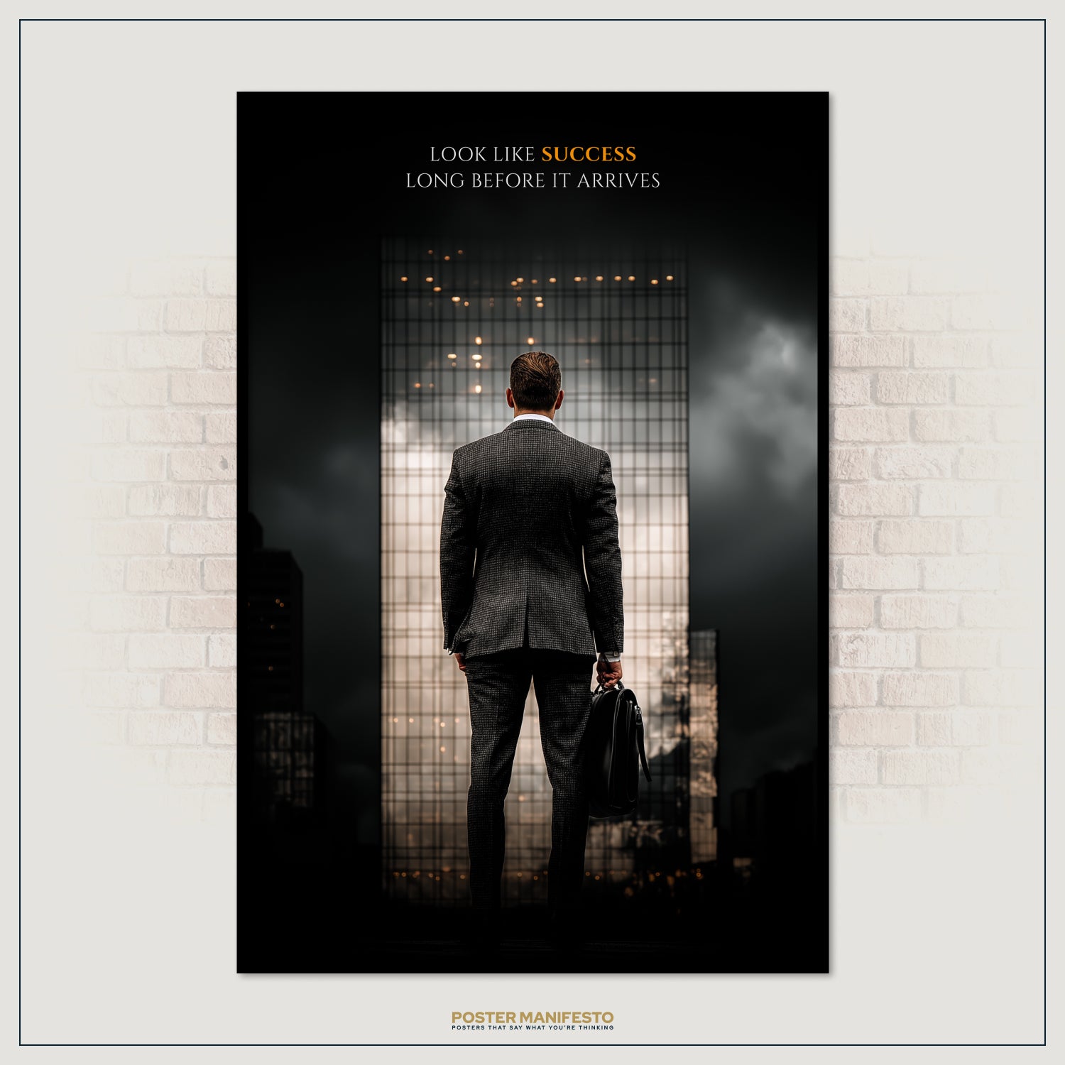 Poster of a man in a suit standing in front of a grid wall with motivational text, framed against a white brick wall.