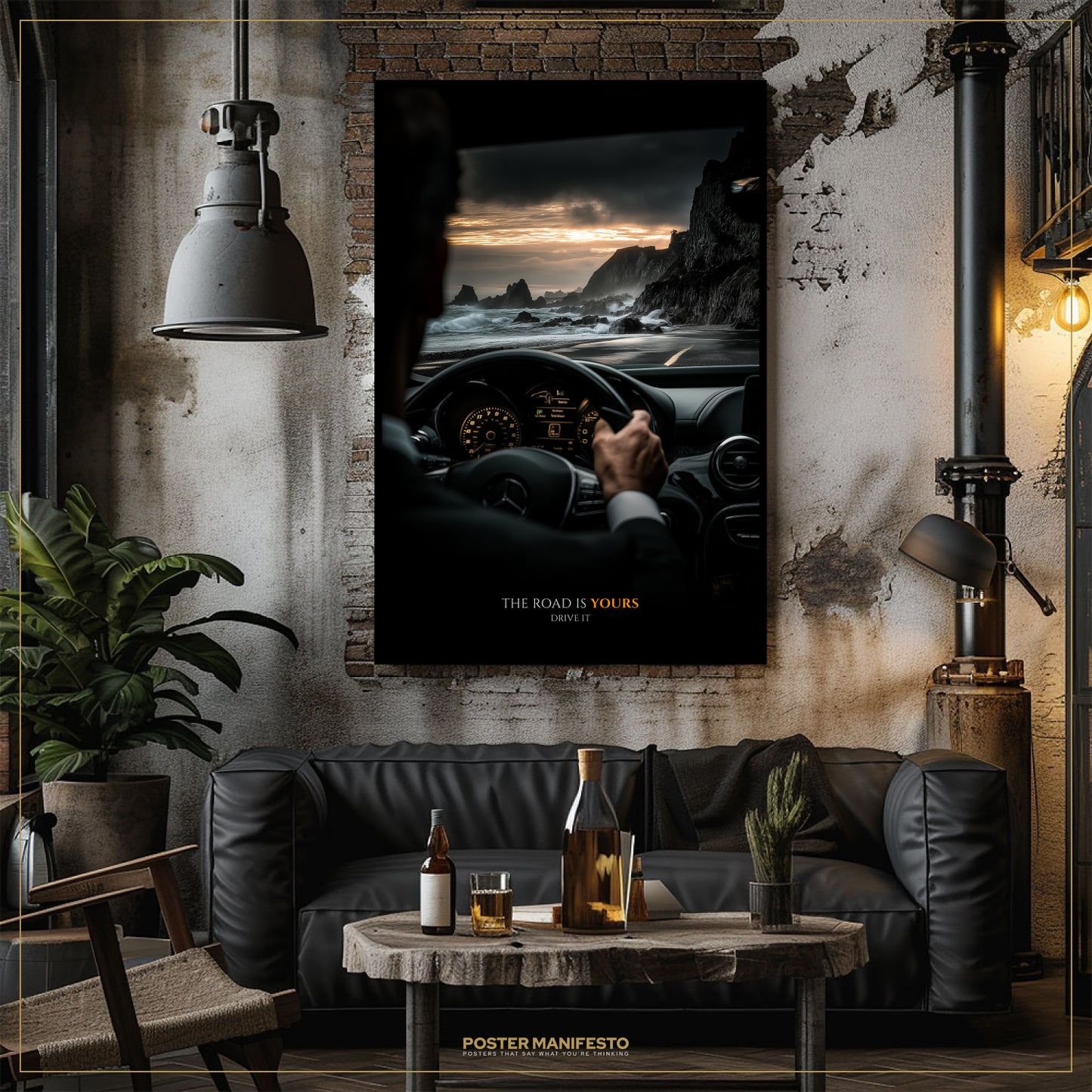 Living room with a large framed poster of a person driving, a black leather sofa, and a small table with drinks.