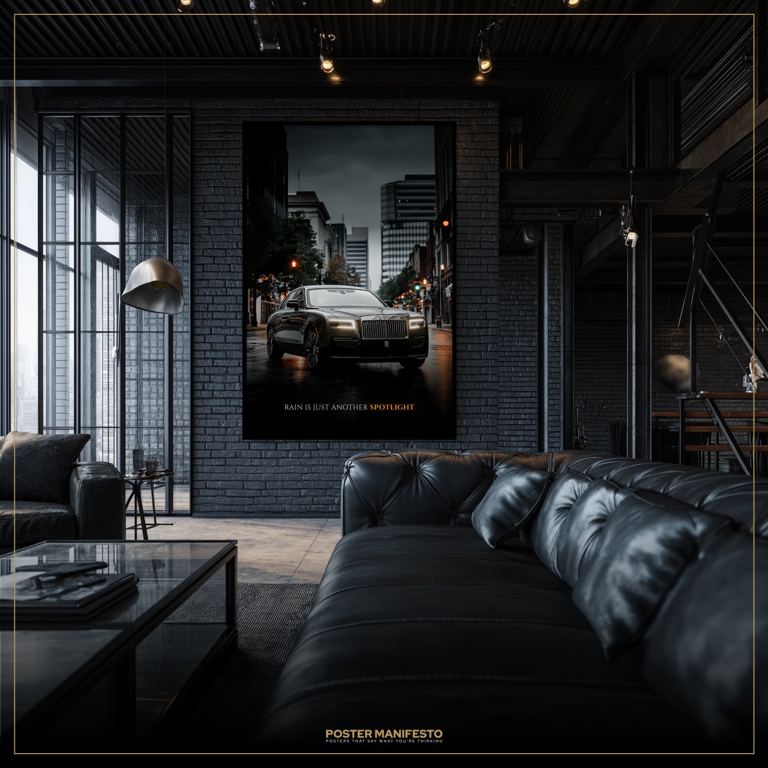 Modern living room with a large black leather sofa and a framed poster of a car on the wall.