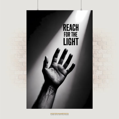 Black and white photo of a hand reaching toward a beam of light with text “Reach for the Light”