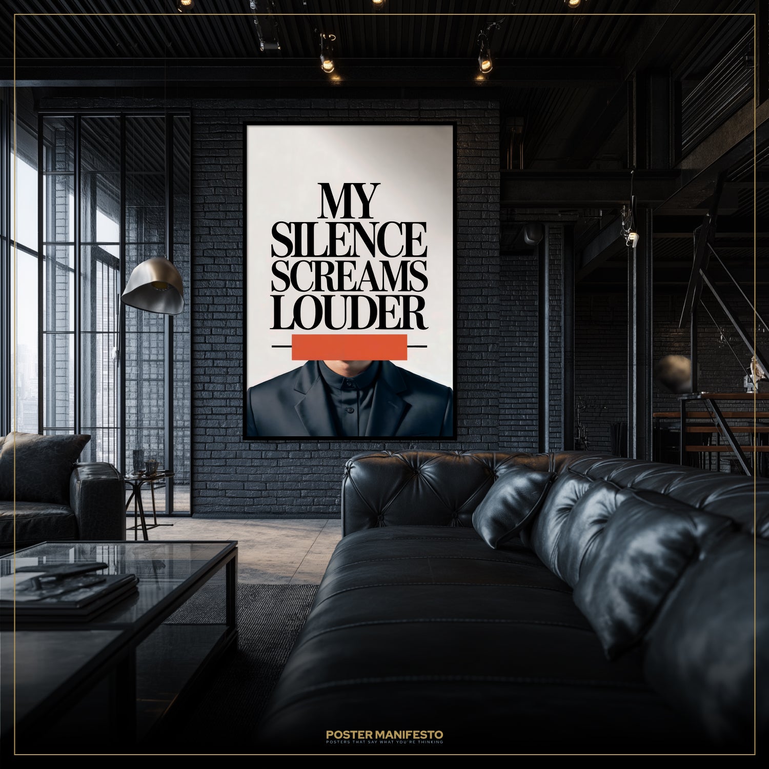 Modern living room with a black leather sofa and a framed poster on the wall.