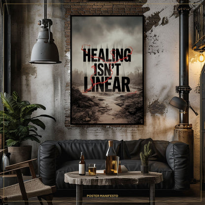 Living room with a 'Healing Isn't Linear' poster on the wall, a black sofa, and a wooden table with drinks.