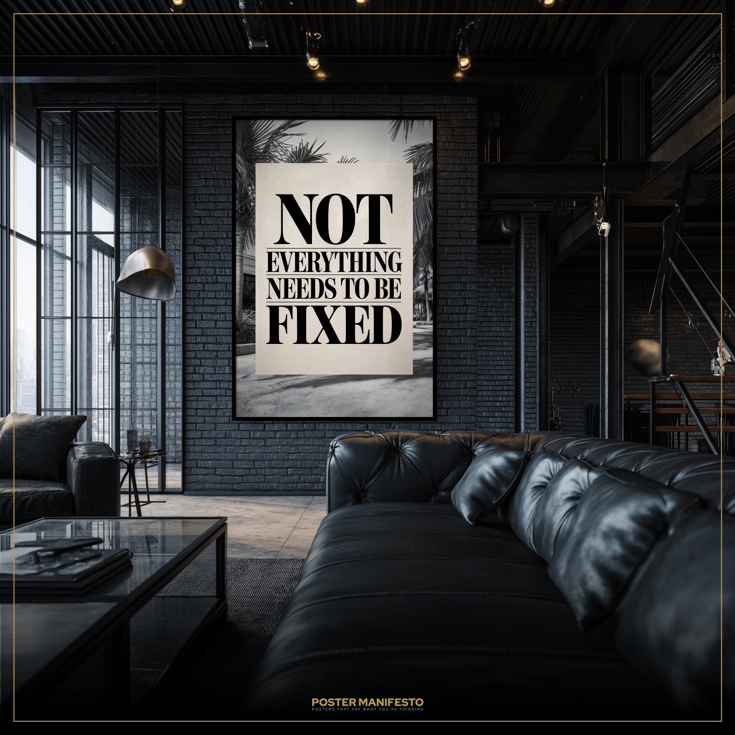 Modern living room with a black leather sofa and a motivational poster on the wall.