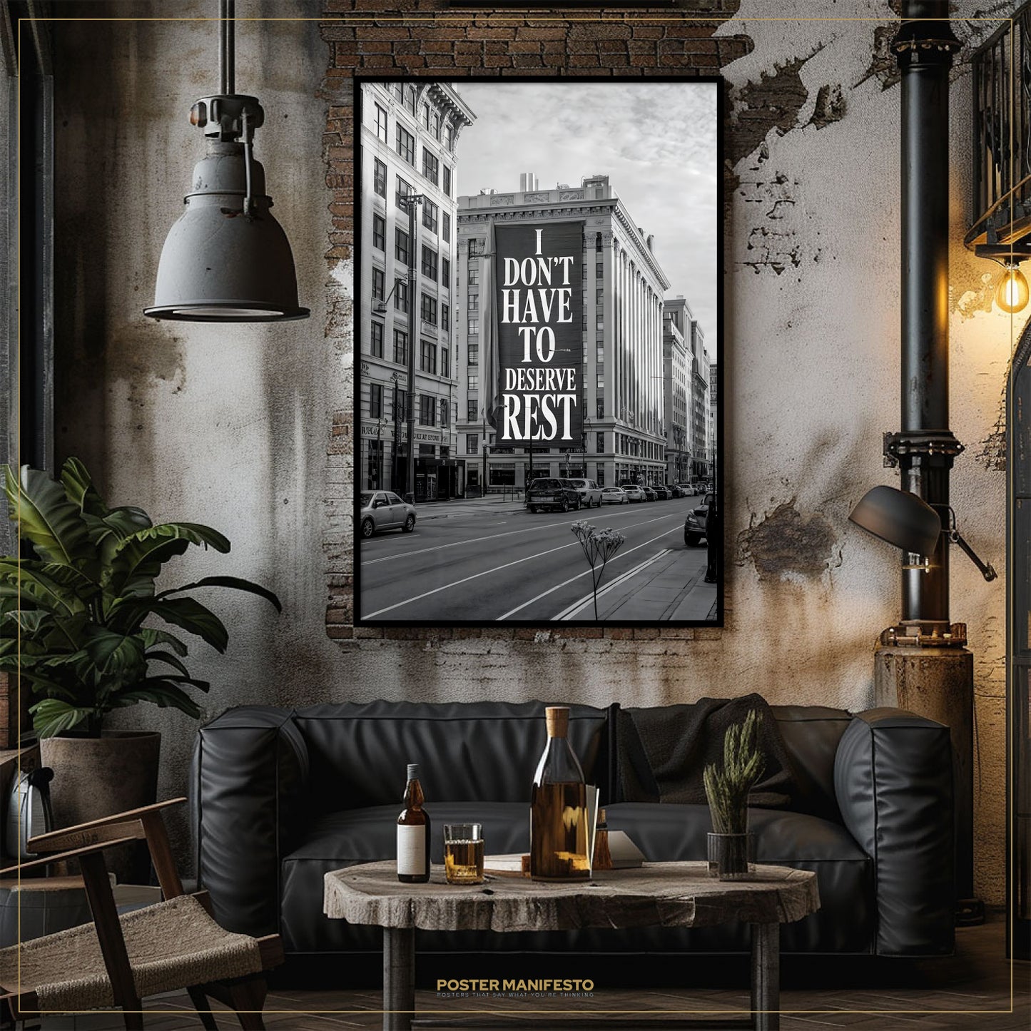 Living room with black leather sofa, wooden coffee table, and framed poster on the wall.