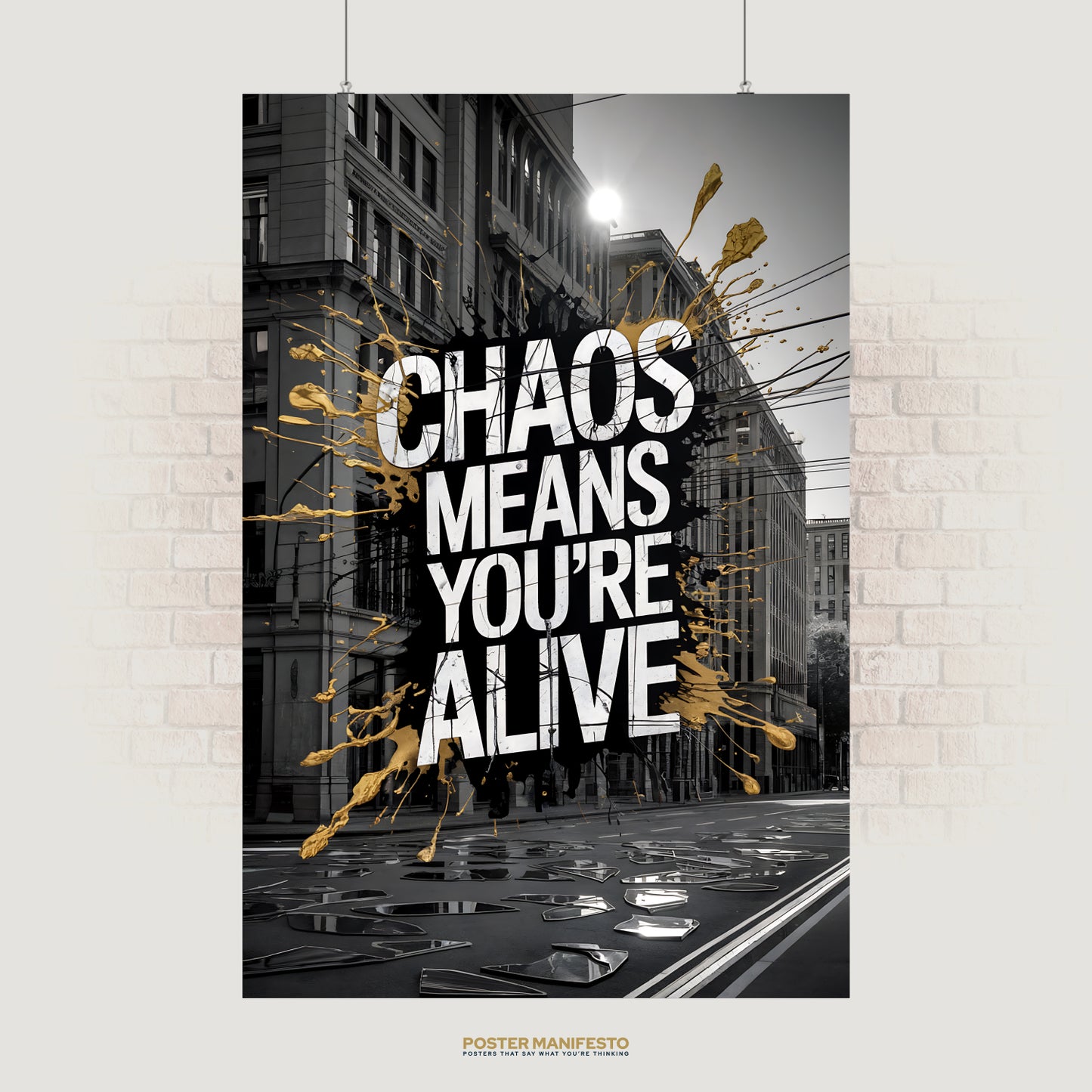 Urban street art poster with “Chaos Means You’re Alive” and gold paint splashes