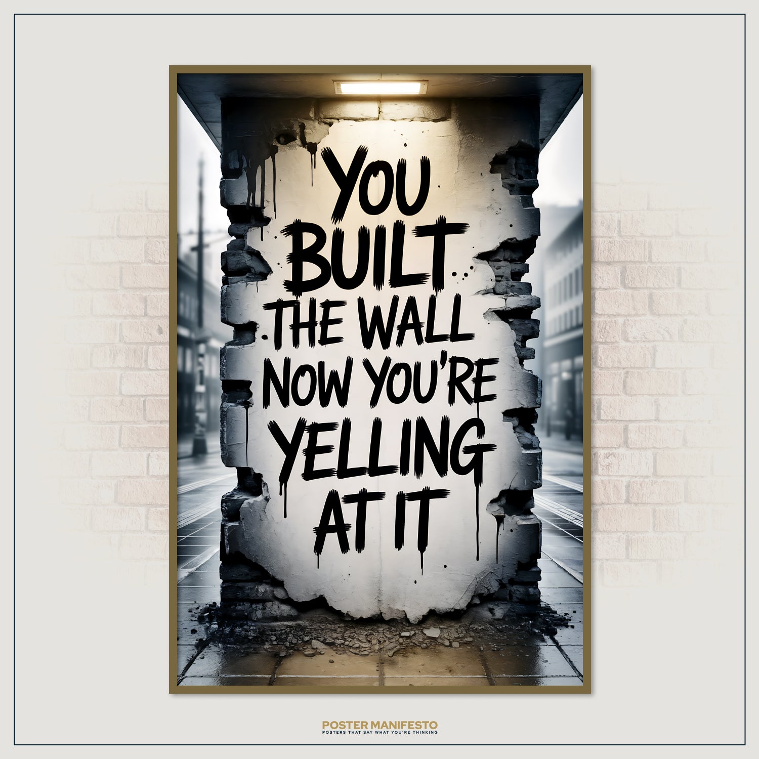 Gritty street photography artwork of a broken concrete wall covered in powerful graffiti text, stating “You Built The Wall. Now You’re Yelling At It,” in a moody cityscape.
