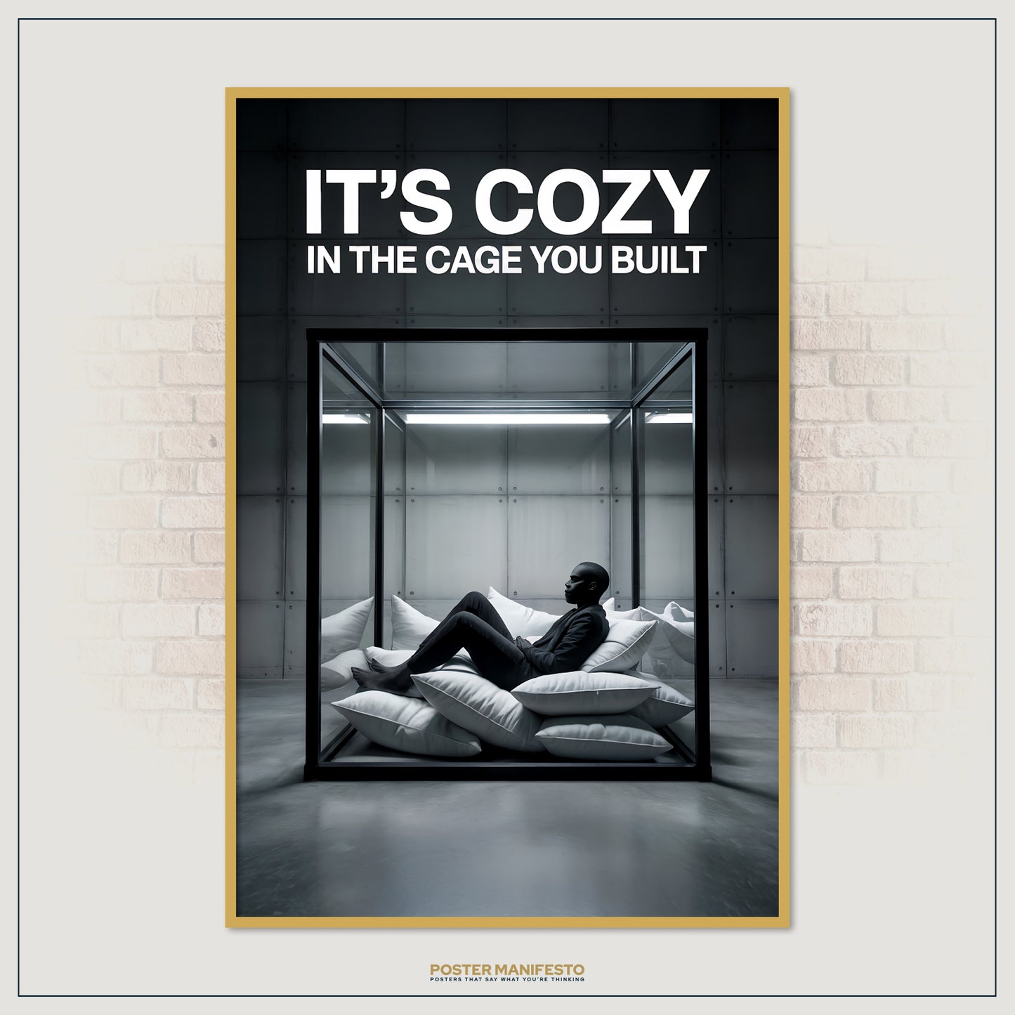 Conceptual wall art of a sleek glass enclosure containing a man seated on cushions, with bold white typography above stating “It’s Cozy In The Cage You Built.”