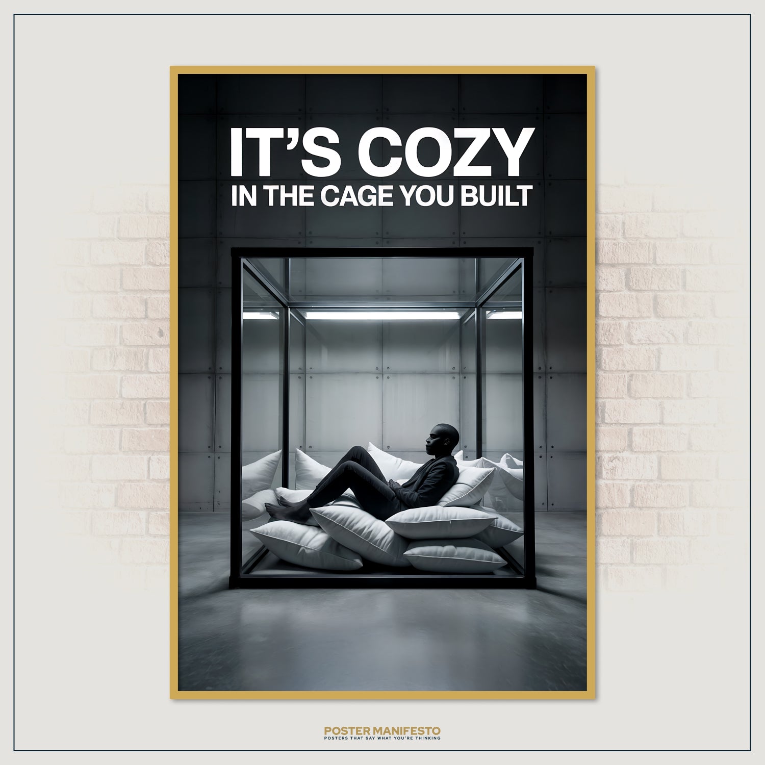 Conceptual wall art of a sleek glass enclosure containing a man seated on cushions, with bold white typography above stating “It’s Cozy In The Cage You Built.”