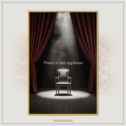 Striking minimal stage-themed print of a lone chair in soft mist, underlining the message “Peace is not applause.”