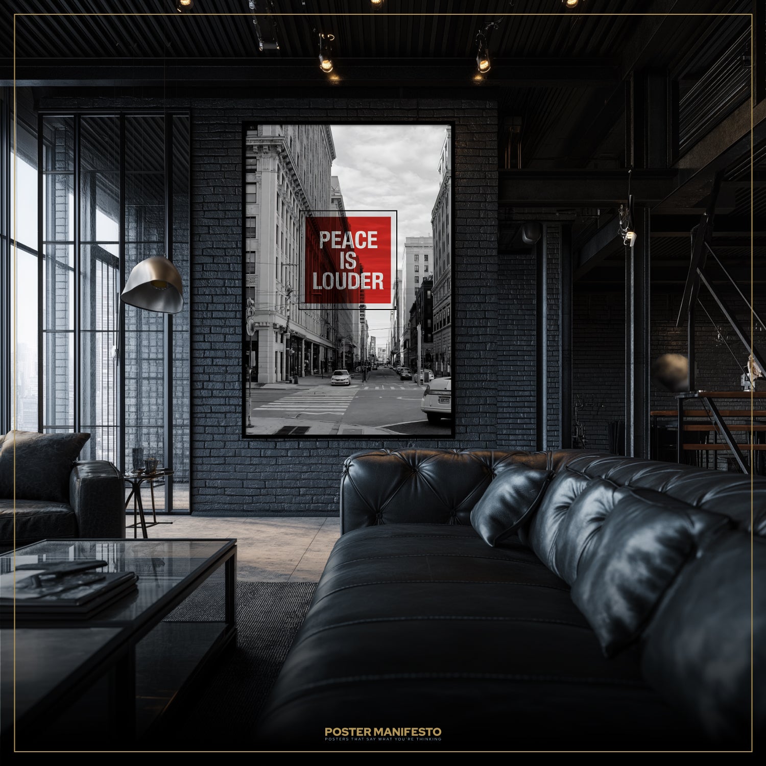 Modern interior with a large framed picture on the wall and a black leather sofa.