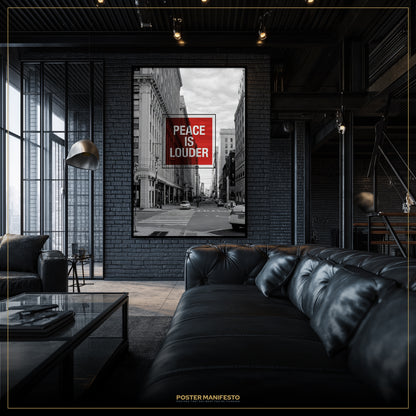 Modern interior with a large framed picture on the wall and a black leather sofa.