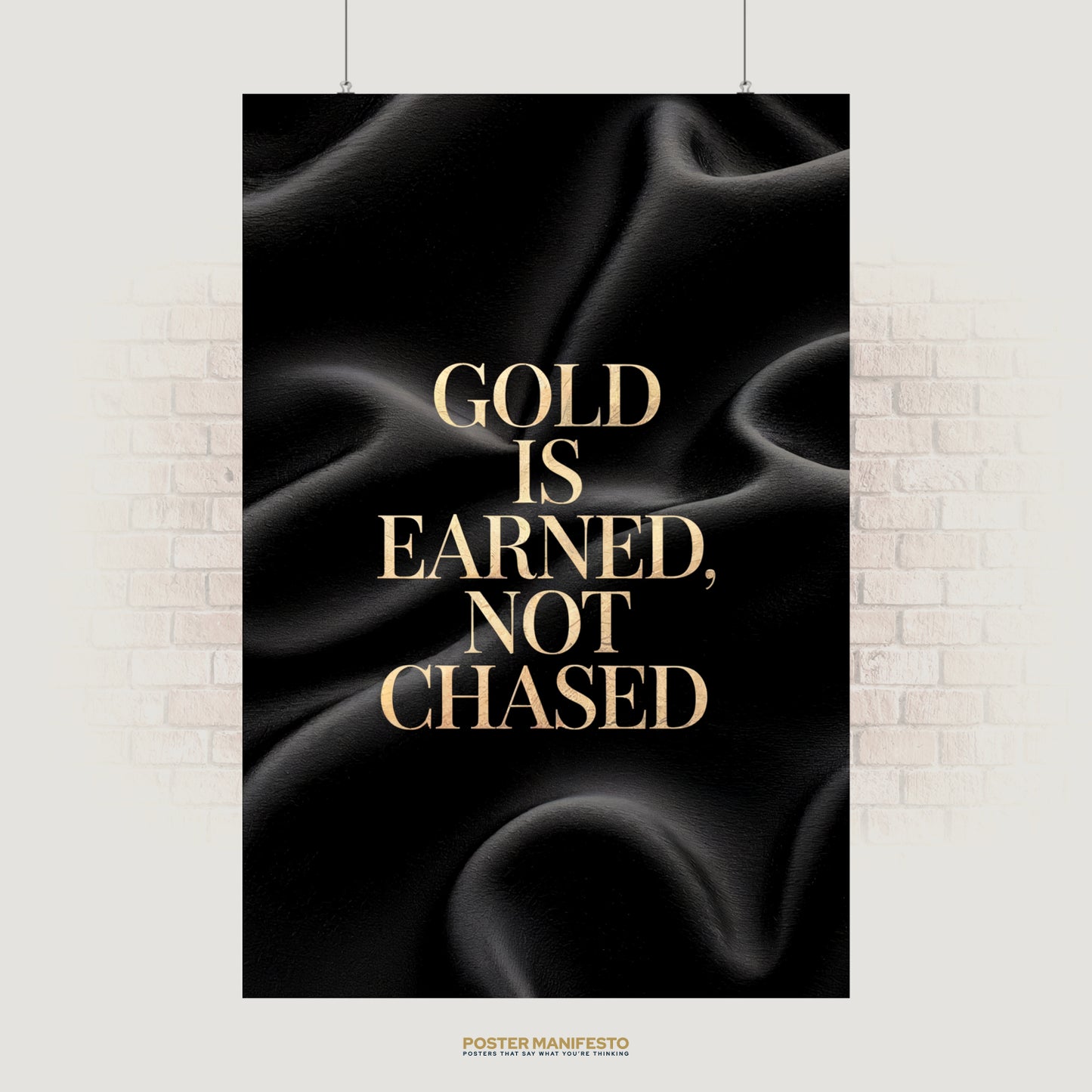 Luxury motivational poster with bold gold text reading “Gold Is Earned, Not Chased” against a black silk background, perfect for office or home decor to inspire discipline and success.