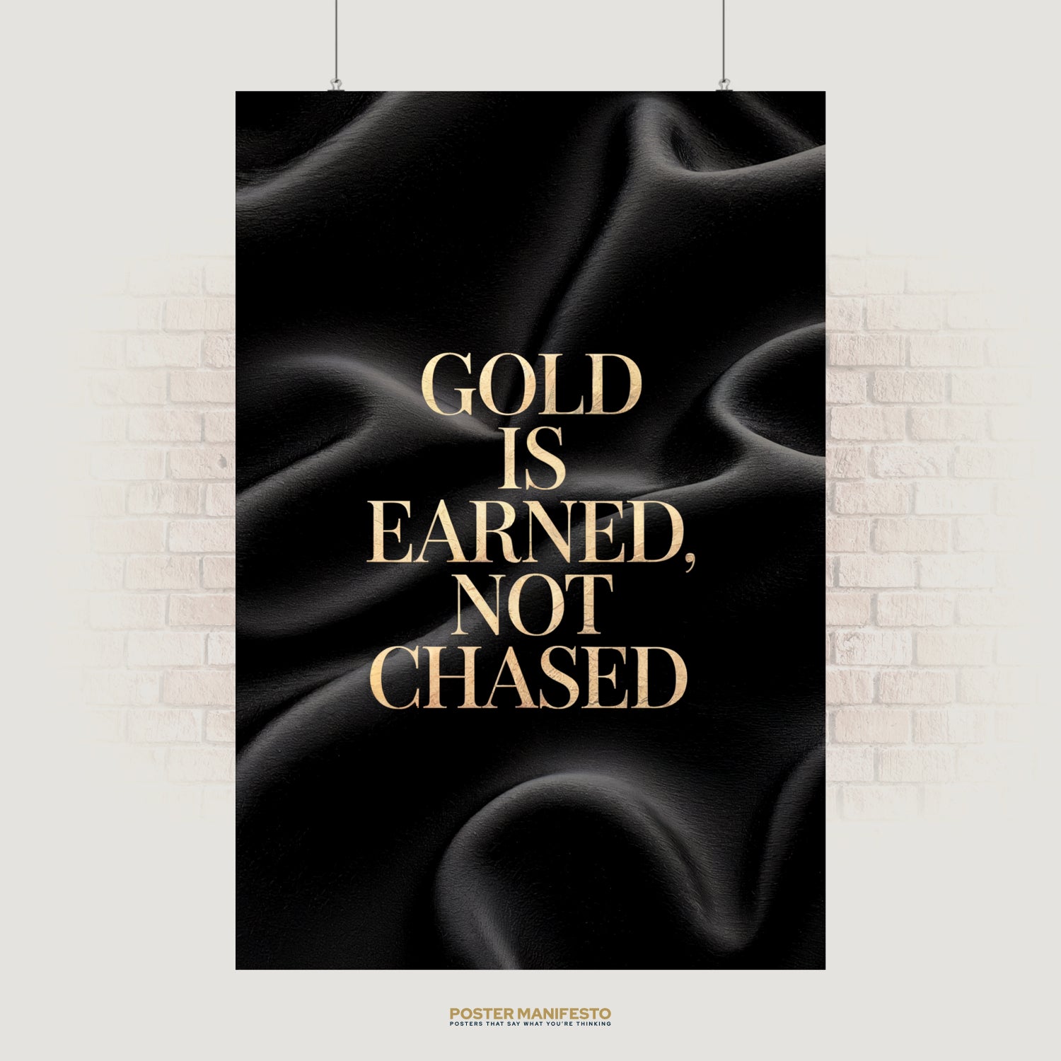 Luxury motivational poster with bold gold text reading “Gold Is Earned, Not Chased” against a black silk background, perfect for office or home decor to inspire discipline and success.