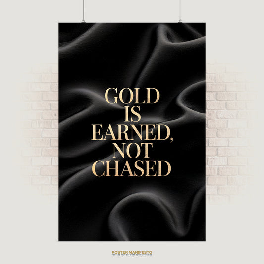Luxury motivational poster with bold gold text reading “Gold Is Earned, Not Chased” against a black silk background, perfect for office or home decor to inspire discipline and success.