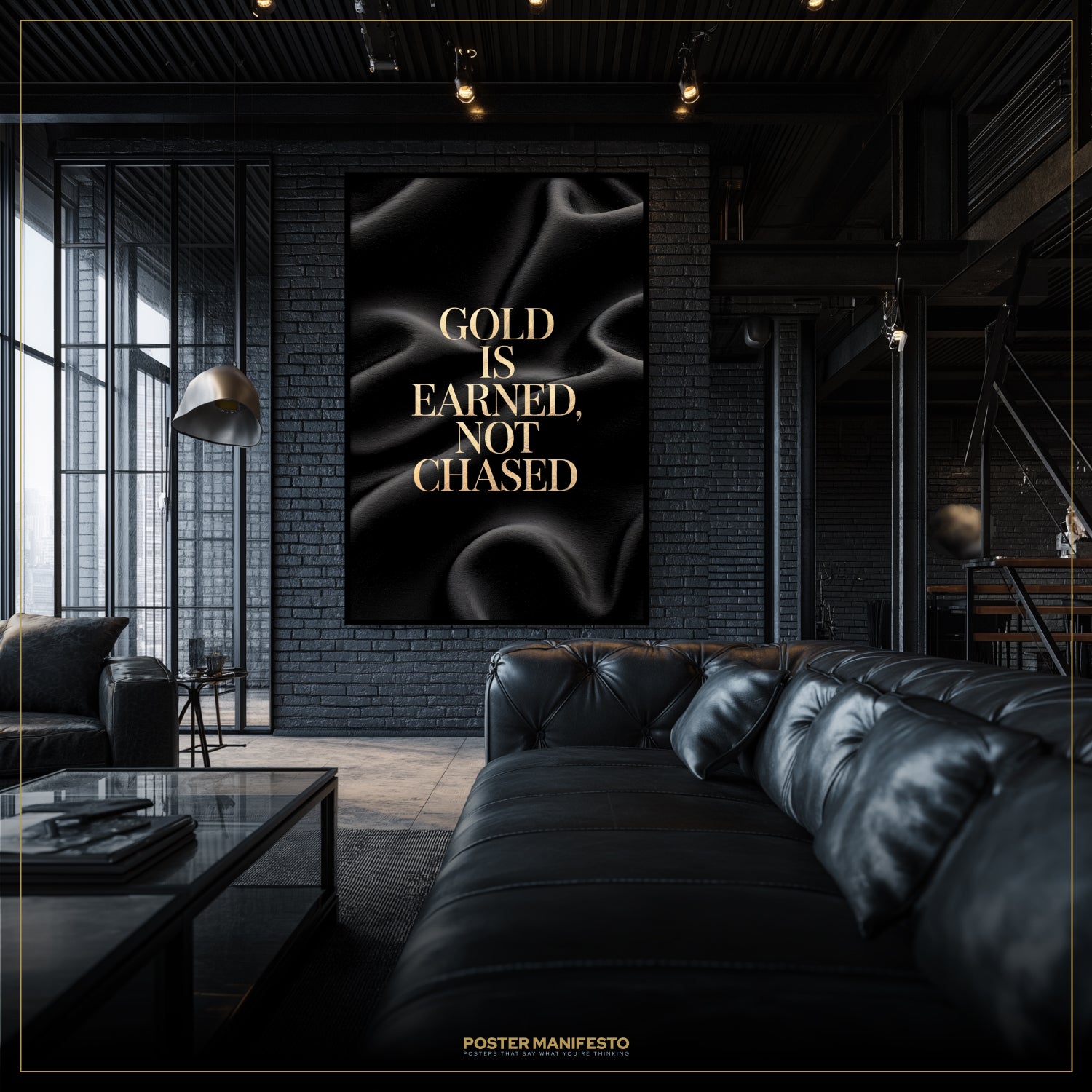 Modern interior with a black leather sofa and a motivational poster on the wall.