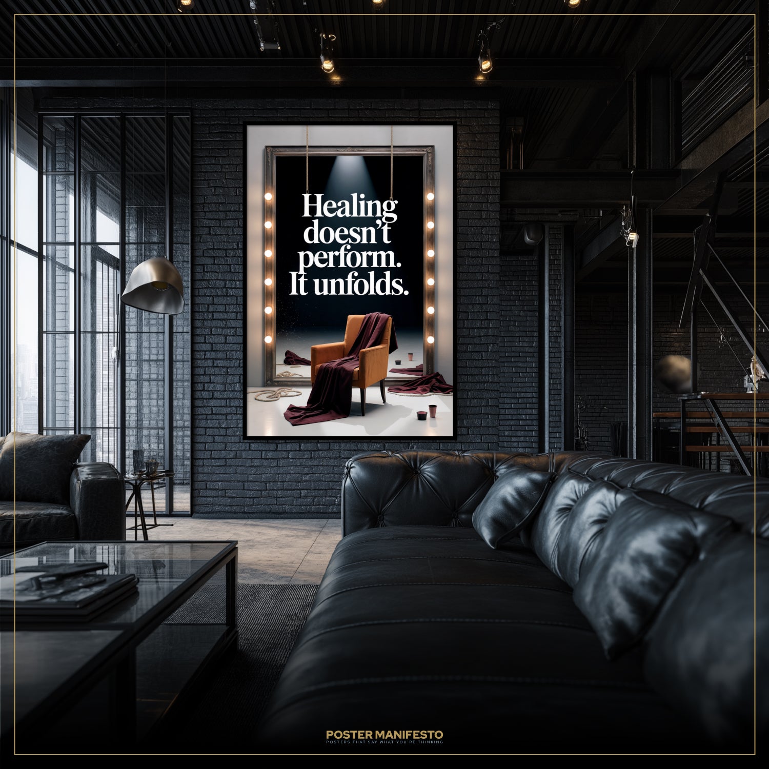 Modern interior with a black leather sofa and a framed quote on the wall.