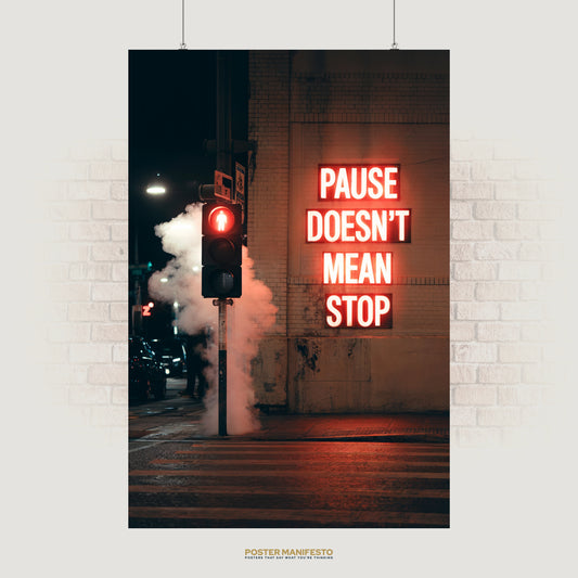 Motivational poster featuring neon text “Pause Doesn’t Mean Stop” glowing on a brick wall at night with a traffic light.