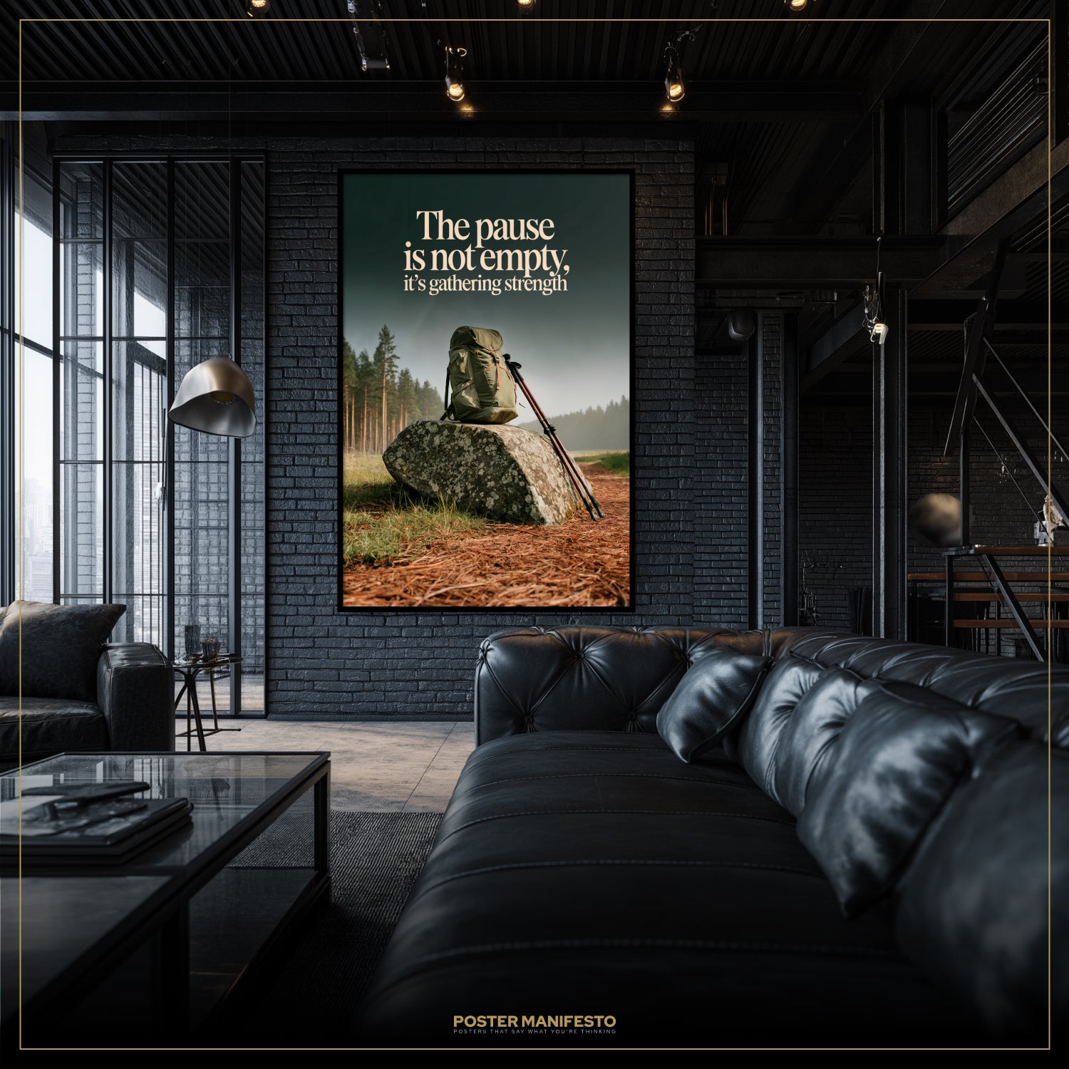 Living room with a large framed poster on the wall, featuring a statue and text.