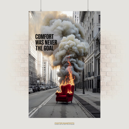 Motivational poster with the quote “Comfort Was Never the Goal” and a burning red chair.