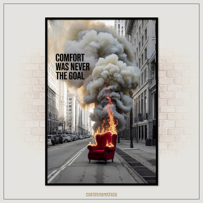 Poster with a red chair on fire and smoke billowing, text 'COMFORT WAS NEVER THE GOAL', on a city street background.