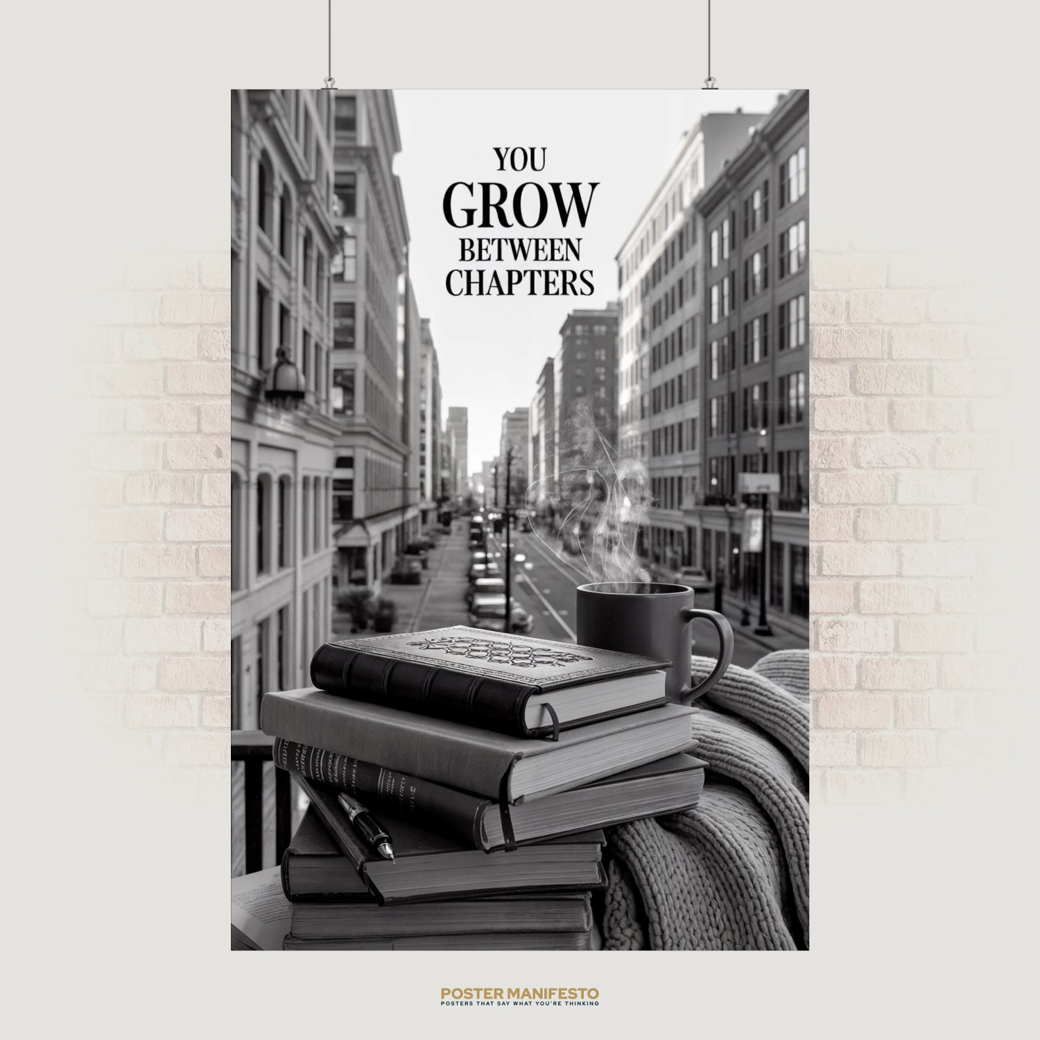 Motivational poster with the quote “You Grow Between Chapters” above a stack of books and coffee in front of a city street.