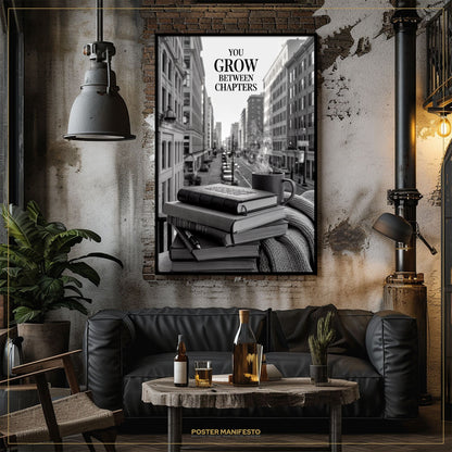 Modern living room with a black leather sofa, wooden coffee table, and framed poster on the wall.