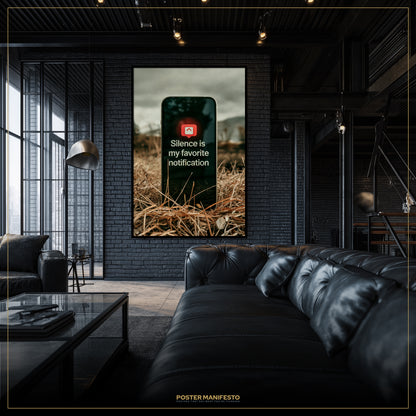 Modern living room with a black leather sofa and a framed poster on the wall.