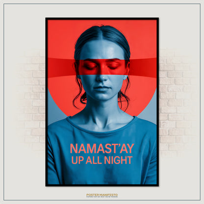 Framed poster with a person wearing a blue shirt and red blindfold, text 'Namast'ay Up All Night', on a brick wall background.